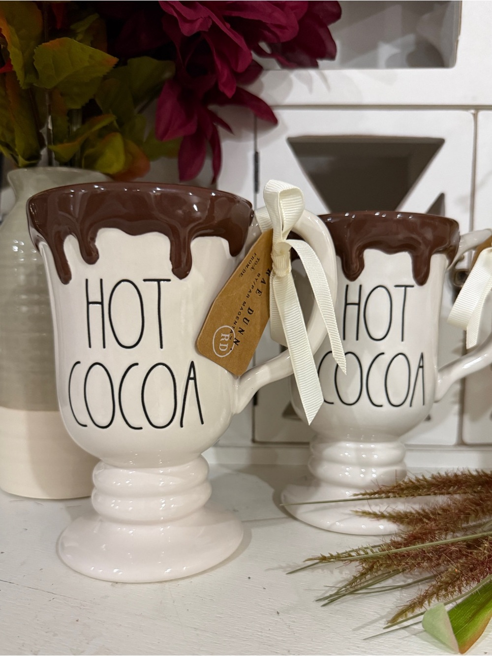 Set of two Rae Dunn hot cocoa footed mugs